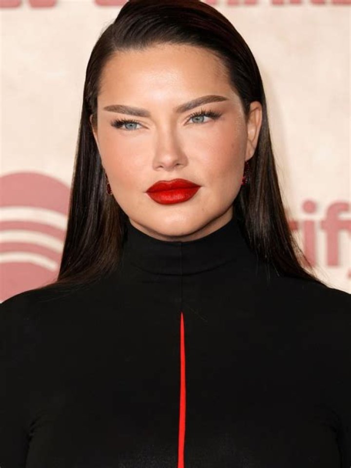 Adriana Lima looks completely different at Hunger Games prequel film premiere