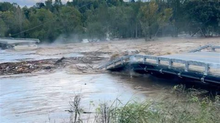 Bridges washed away by swollen rivers as severe weather batters Otago and Southland