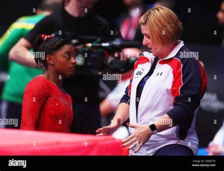 GLASGOW, SCOTLAND - OCTOBER 29: Simone Biles of USA and Gabrielle Douglas of USA celebrate after th