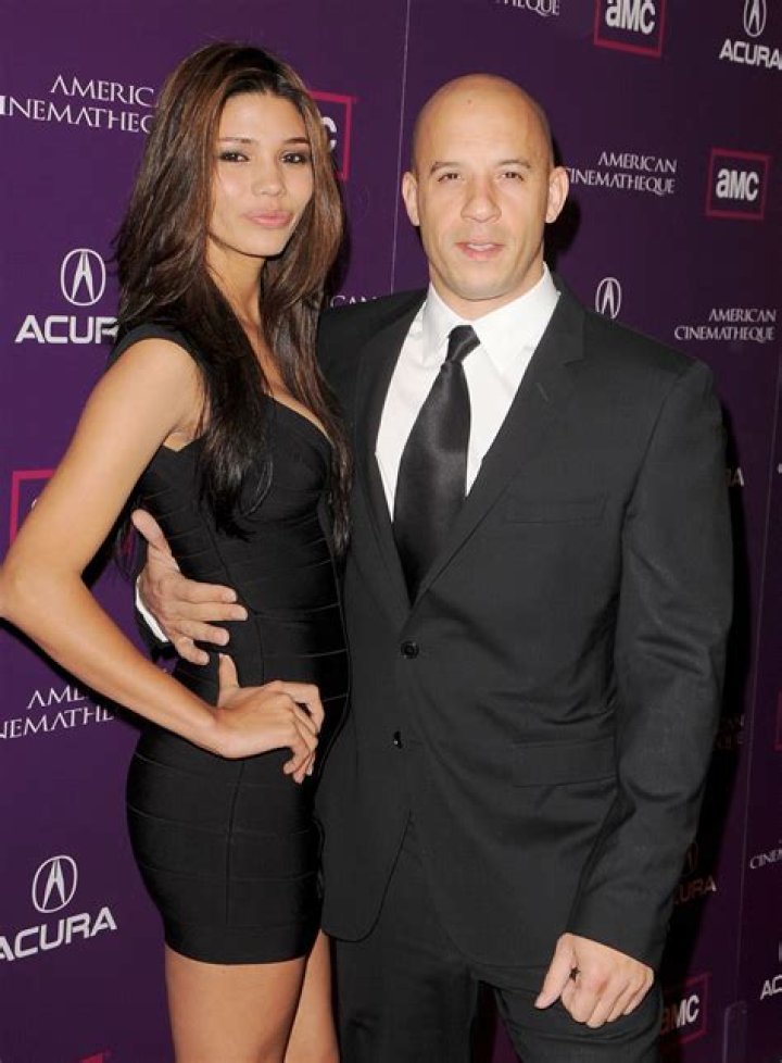 (L-R) Vin Diesel and Paloma Jimenez attend the Charlize Theron Africa Outreach Project 2023 Block Party at Universal Studios Backlot on May 20, 2023 in Universal City, California.